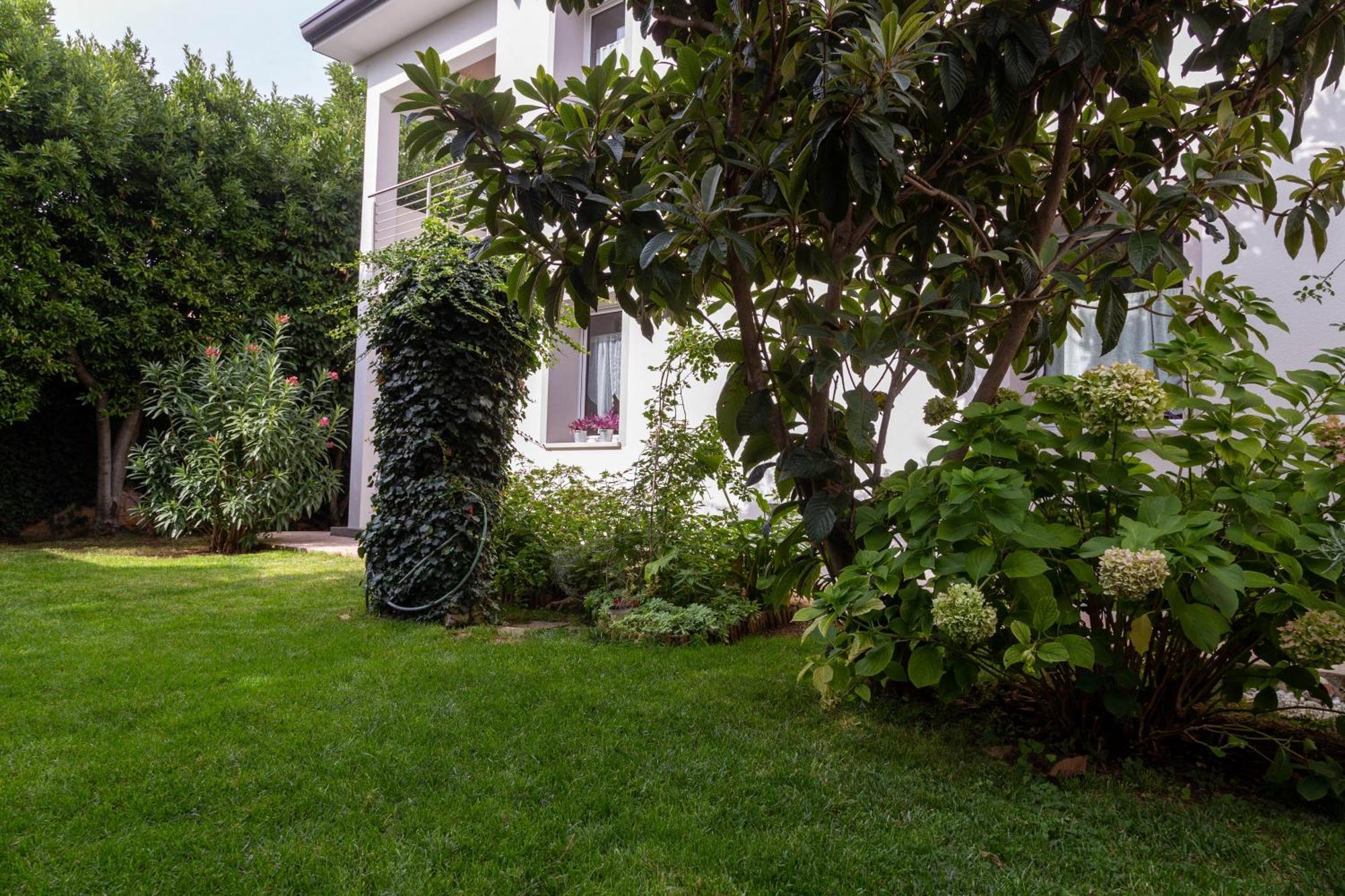Appartamento Con Giardino Le Querce Sistiana Eksteriør billede